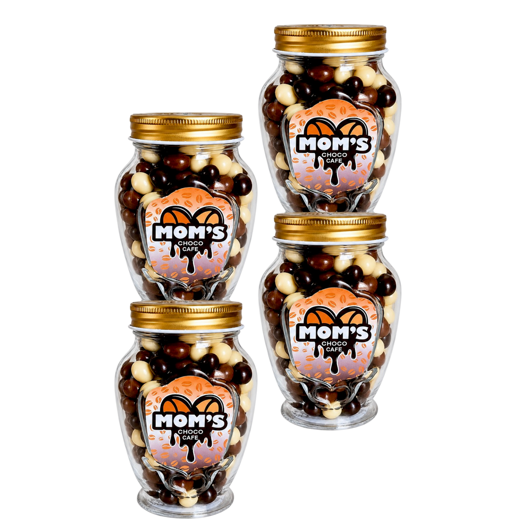Four jars of 'Mom's Choco' chocolate treats with gold lids on a white background.